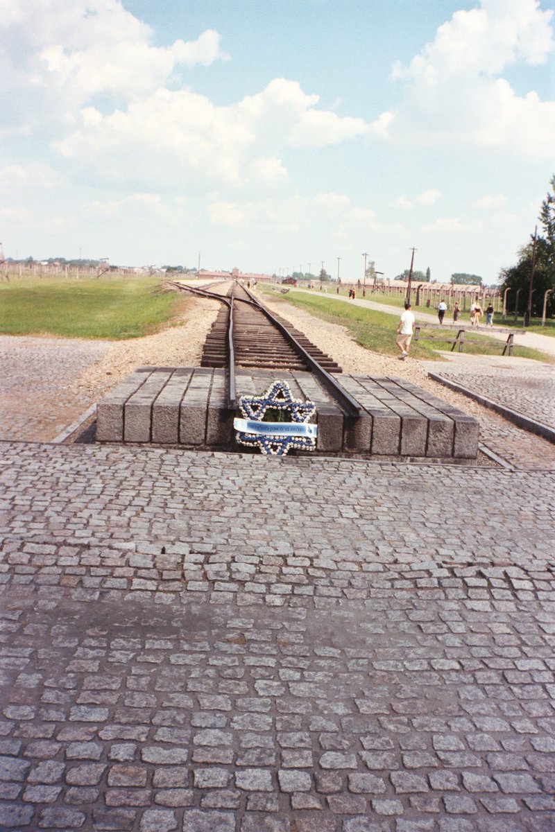 LeadinginWales's tweet photo. #HolocaustRemembranceDay Auschwitz-Birkenau #2003 was simply so #deeplymoving #Birkenau is indescribable #theendoftheline There is a palpable emotional memory of so much horror, pain, despair & fear in a quiet & still landsacape, with only the sound of birds #wemustneverforget https://t.co/Ahe2oDJwnR