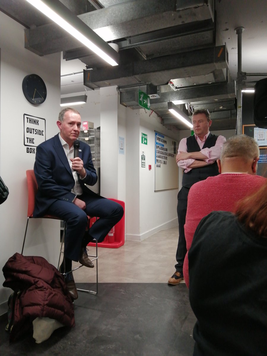 Paul Matthews and Roger Hiscott at Medtech Monday, the sign behind Paul is so well placed