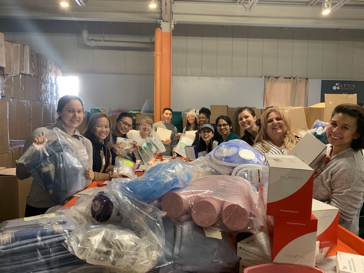 PatrickRCNS's tweet photo. MICU staff pack medical supplies for Ayfa Foundation, a non-profit group that rescues no longer needed medical supplies and delivers them to clinics in need around the world.  Learn more at https://t.co/ALDiS7bdhS , or check with Fiorella in MICU to help.  #number1micu #qualityrn https://t.co/CkQ652dAak
