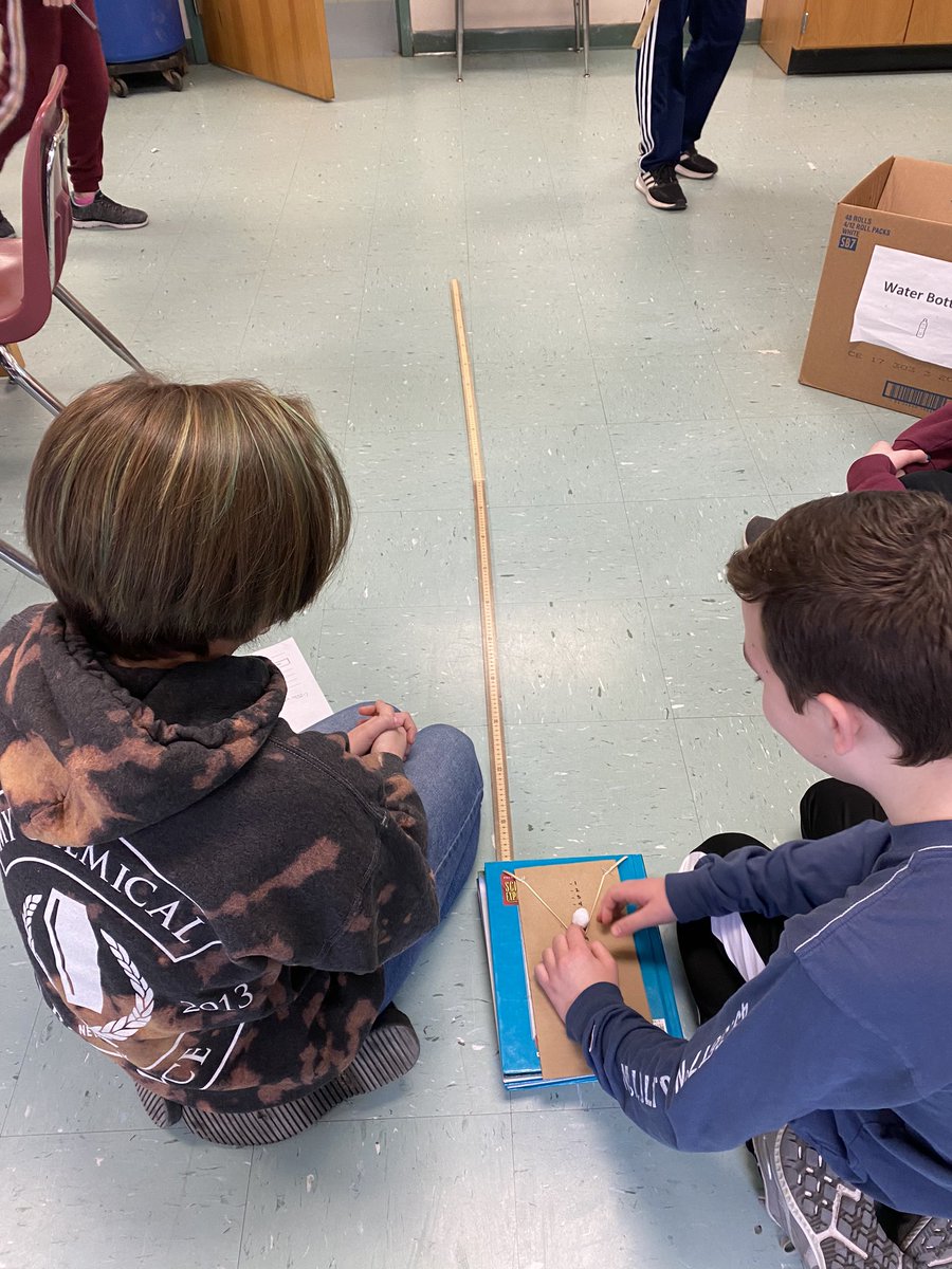 Rubber band launcher time! Learning about the relationship between potential and kinetic energy.