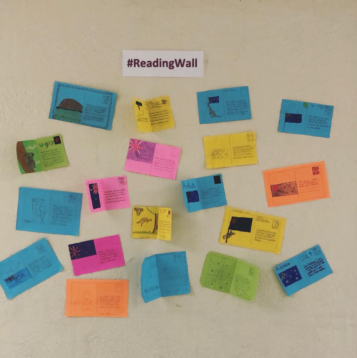 ivette0920's tweet photo. Students in Ms. Mulet’s class start off our reading wall with their destination postcards.. Here are some wonderful places books can take you to! #ReadingWall @NorthHialeah @MDCPSNorth @MDCPS_ELA https://t.co/7PkuGy274M