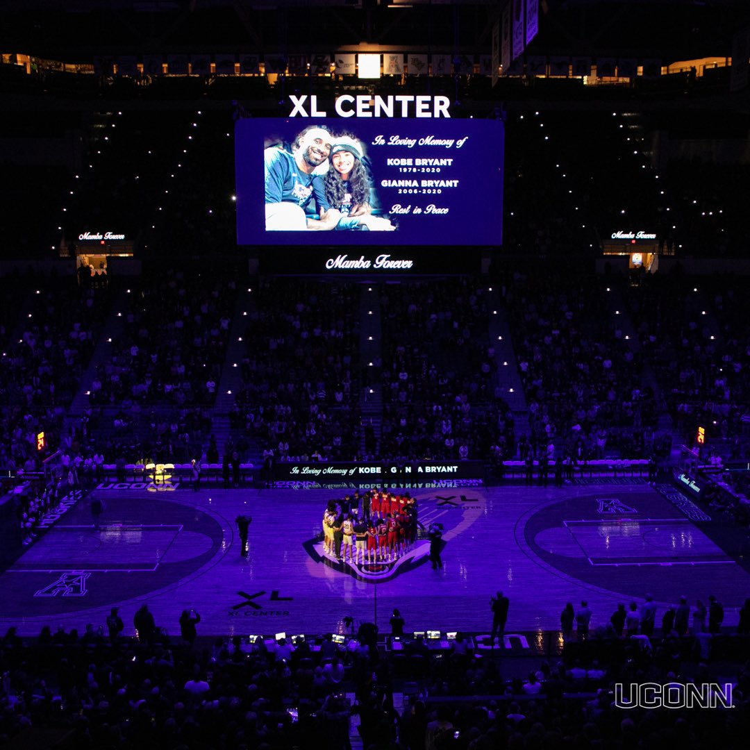 UConnHuskies's tweet photo. Pausing to honor two members of our extended family. 💜💛

#HuskiesForever https://t.co/8GJ0kf0TJA