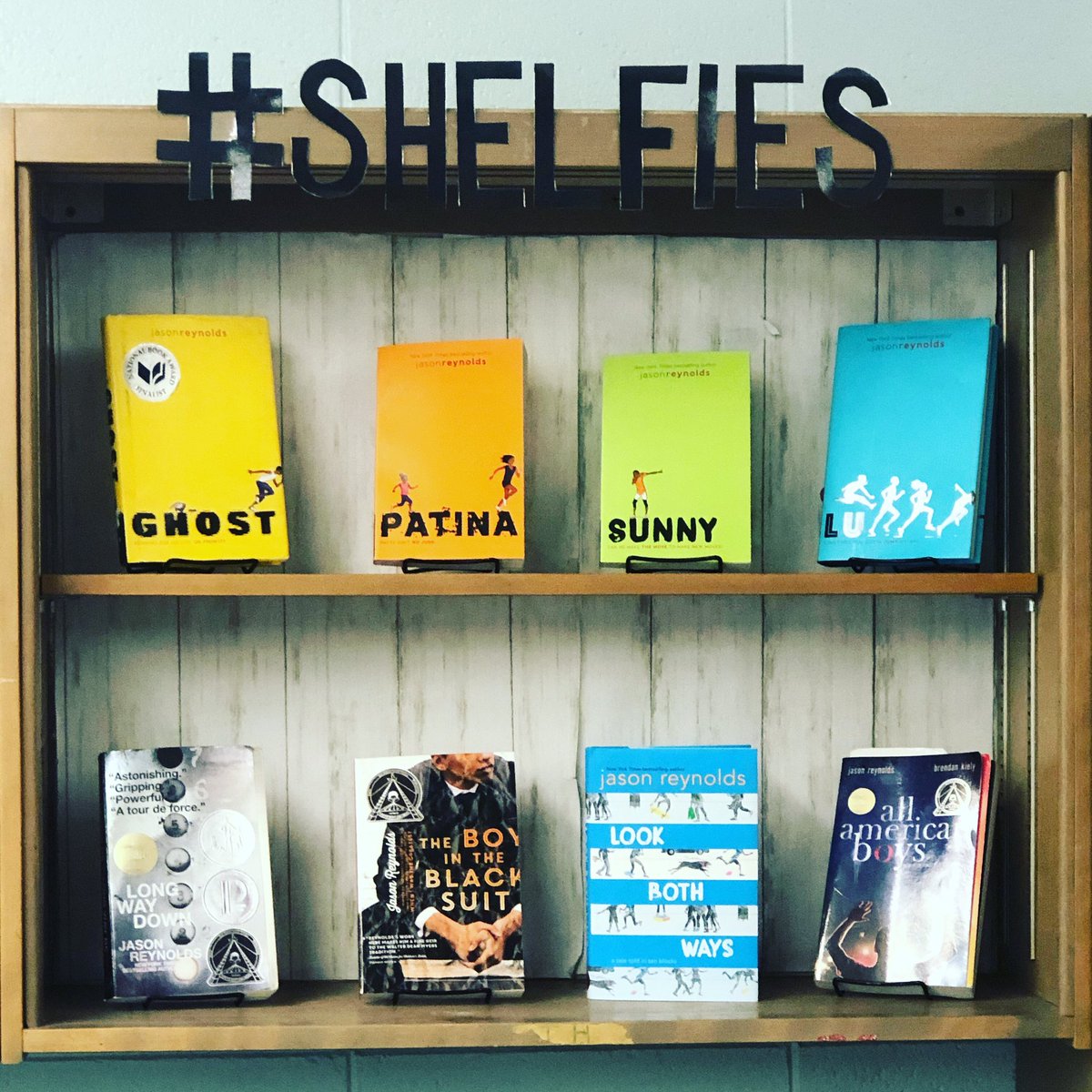 MrsKatieLeahy's tweet photo. I was pumped to make introduce my Ss to @JasonReynolds83 and make him the Spotlight Author on the #shelfies shelf of my class library! I KNOW they will fall in love with his poignant stories and beautiful words!  #tpsprepares #magicinthemiddle #leahysallstars #independentreading https://t.co/DS1eAtMaFi