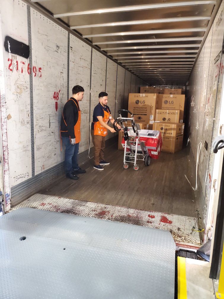 Pflugerville MDO 5837 1st appliance truck. Joe with the MDO training team showing Michael the correct way to dolly the product off the truck so no damages occur to it.