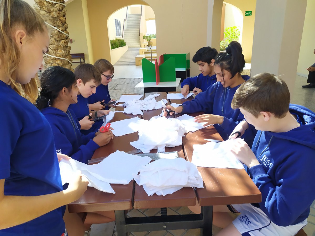 JESSKS4's tweet photo. Year 10 helping fight period poverty. Cutting donated cloth into pieces to be sewn together and taken to Kenya in support of #JESSCAS #JESSRealWorld @WaterAidUK @UKChange https://t.co/pA9ZgHD9s2