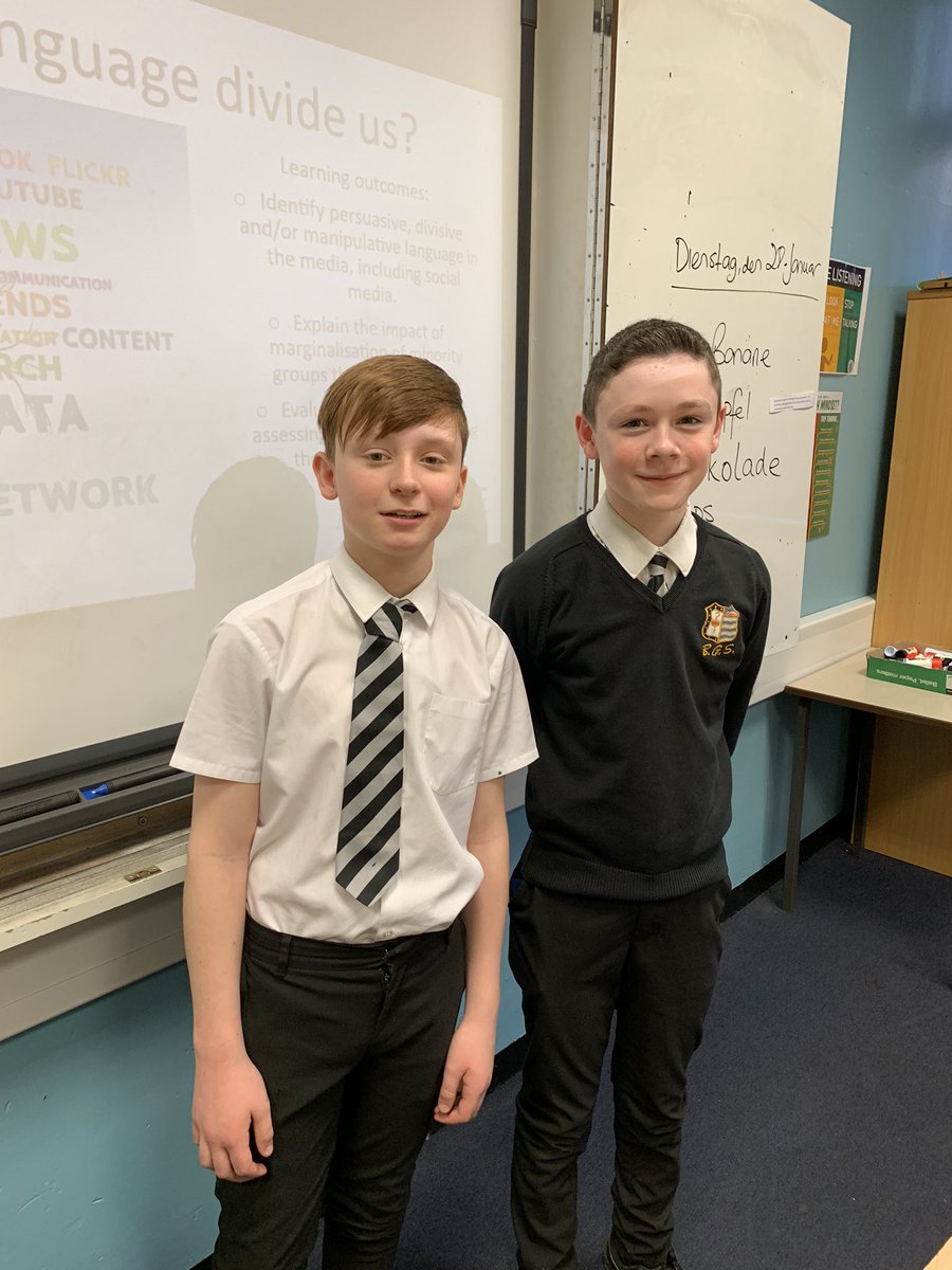 Two Y7 students contributing exceptionally well to a conversation about understanding and preventing extremism in a lesson.