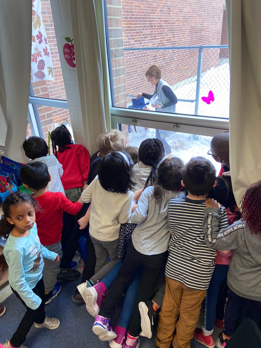 Watching Mrs <a href="/CA_Bohn/">Carol Ann Bohn</a> put birdseed on our class-made snowman’s hat
 ☃️🐿🦅