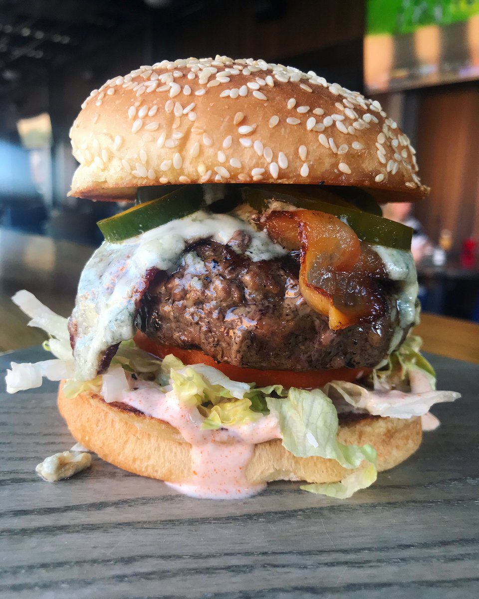 Y’all know we love a good burger night. So plan on joining us for dinner to get this piece of work!
“Dragon Slayer”- burger topped with blue cheese, hot pickles, bacon, LTO all on a sesame seed bun. 
<a href="/Greenville_SC/">VisitGreenvilleSC</a> #burgernight #burgersandbeer