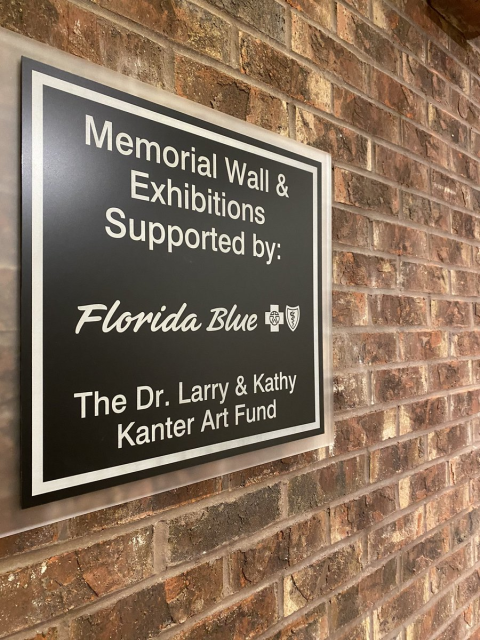 Kbsiegmann's tweet photo. On #WorldHolocaustDay and everyday, it’s important that we remember. We are honored to support @JFCSJax and the Memorial Wall Exhibitions. #NeverAgain #FlBlueLife https://t.co/MBi3341FkL