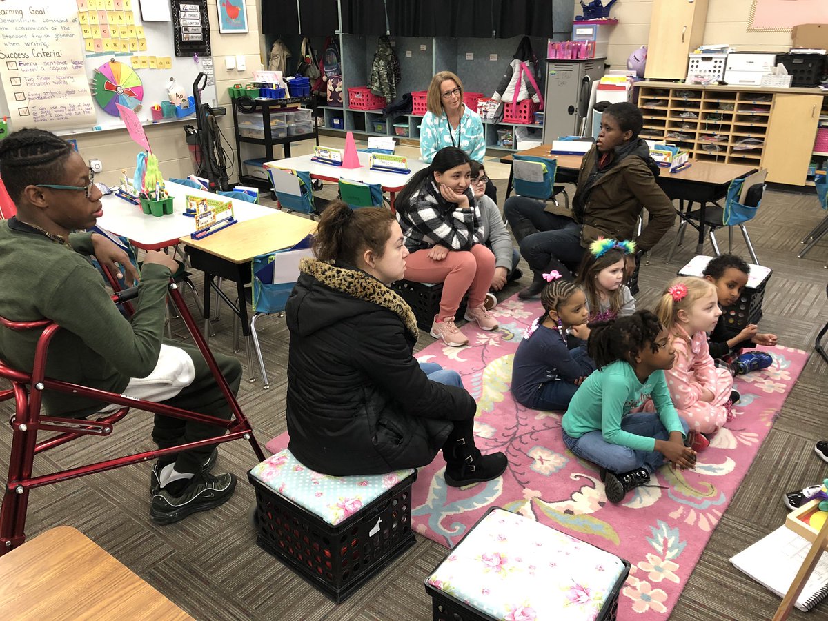 HERlyons's tweet photo. Mrs Hannah’s career class came to our class today. They are here learning about teaching. They also came to read to us! Thank you for spreading kindness! #plsdproud #HeritageLeaders https://t.co/eUGbJtbMEh