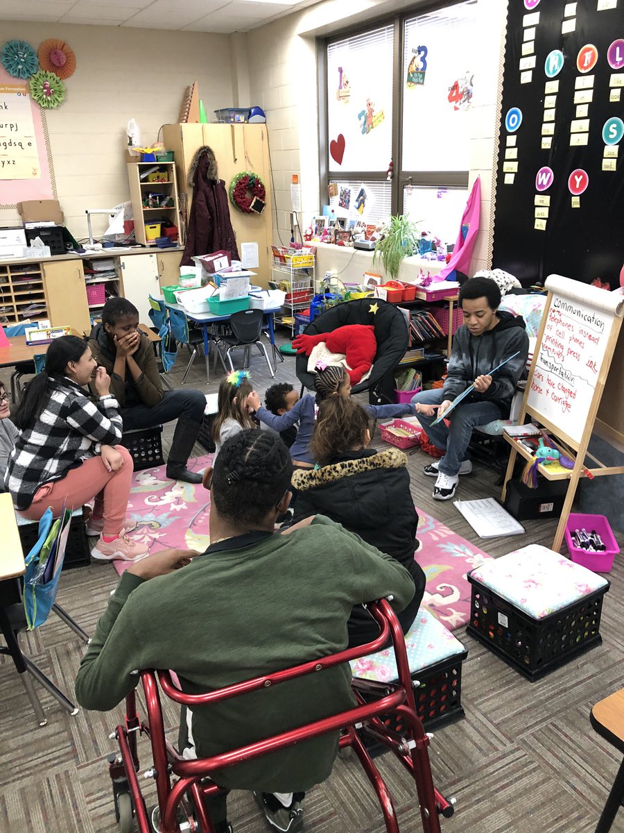 HERlyons's tweet photo. Mrs Hannah’s career class came to our class today. They are here learning about teaching. They also came to read to us! Thank you for spreading kindness! #plsdproud #HeritageLeaders https://t.co/eUGbJtbMEh