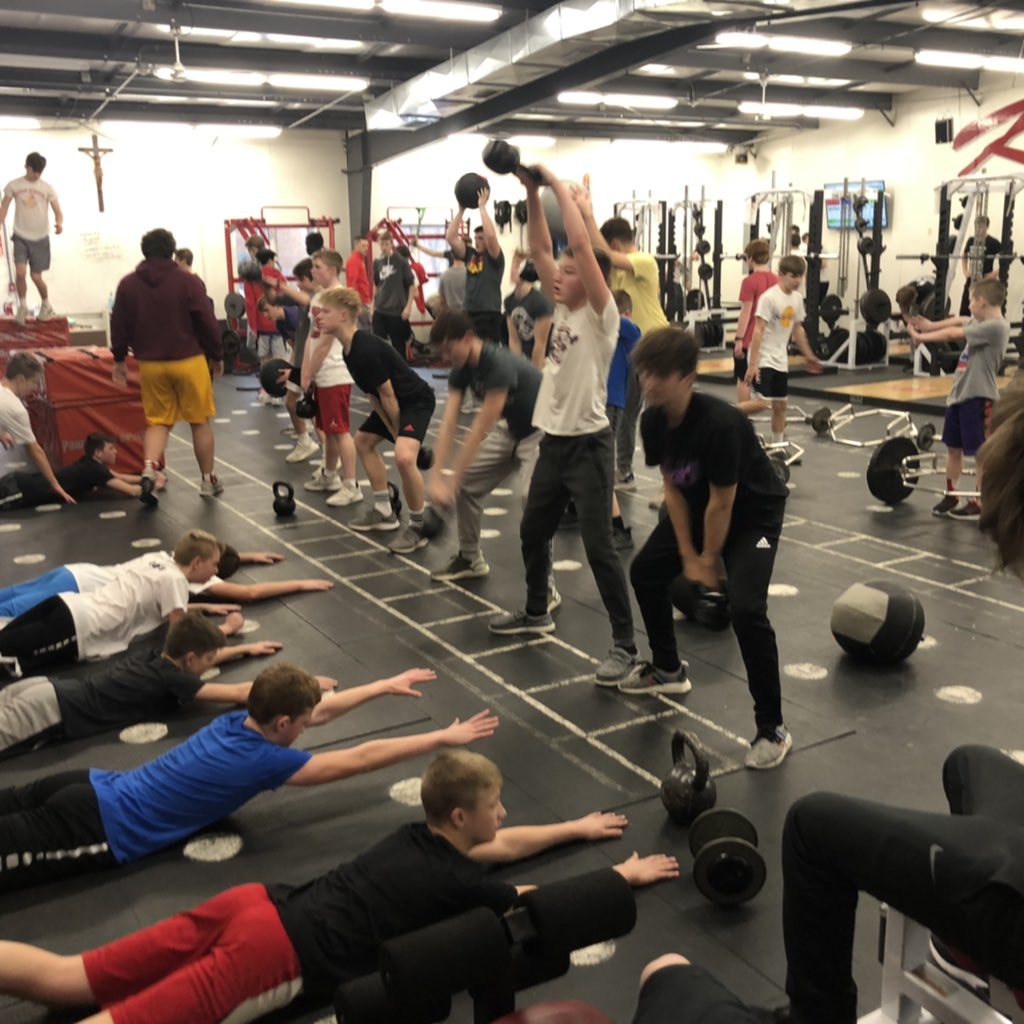 CoachSteinKHS's tweet image. Packed house in the weight room yesterday with over 70 boys! Lots of different ages and ability levels all able to work hard and efficiently thanks to @RackPerformance #GetBetter #KnightStrength #Culture