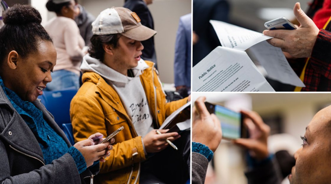 two people reading from phone and paper