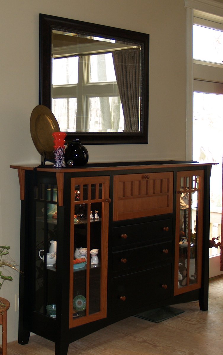 yestertec's tweet image. This is a custom cherry and black curio piece with references to the mission style. It is shown here just so that you know that our styling options can coincide with even your most specific wishes.