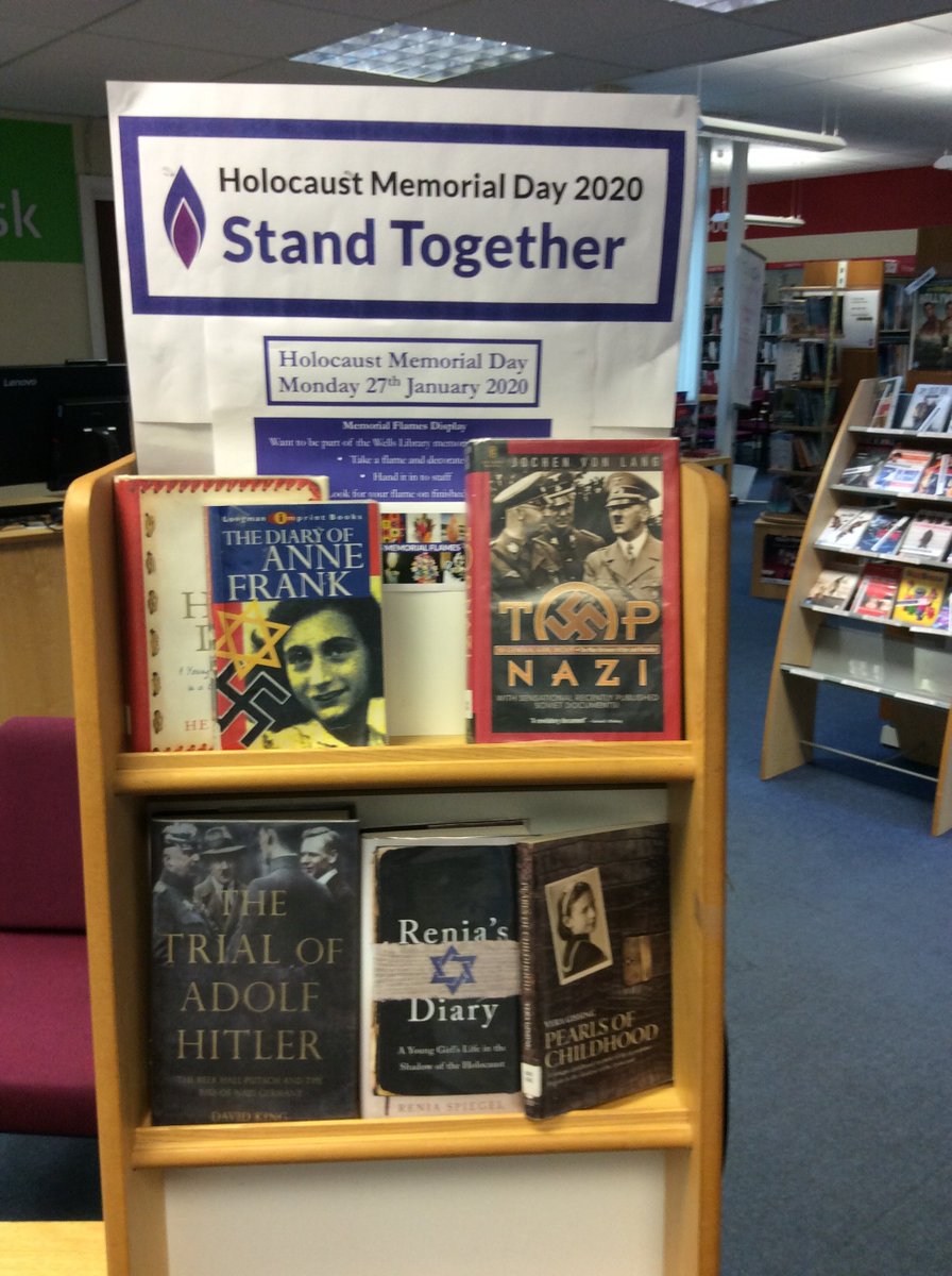 SomersetLib's tweet photo. The Holocaust Memorial display at #WellsLibrary and the Shared Reading Group who chose the Holocaust as their theme at last Friday’s meeting. @HMD_UK @thereaderorg https://t.co/iL8QQlvoCn