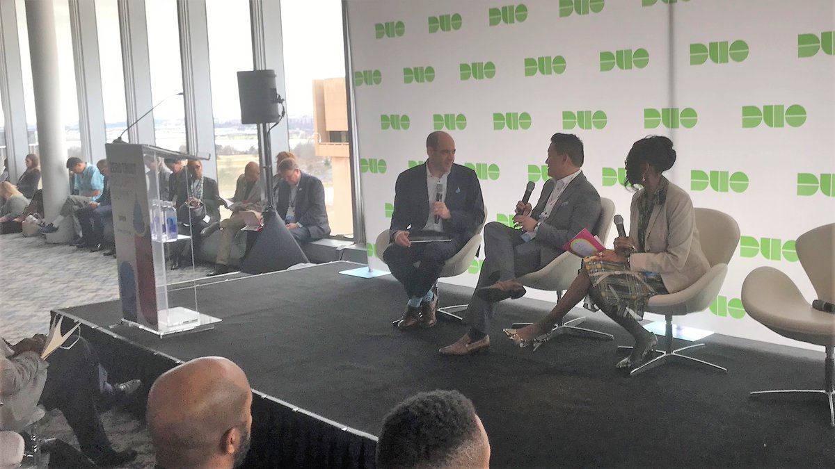 Phil Lam, Executive Director of Identity, GSA, onstage with other panelists