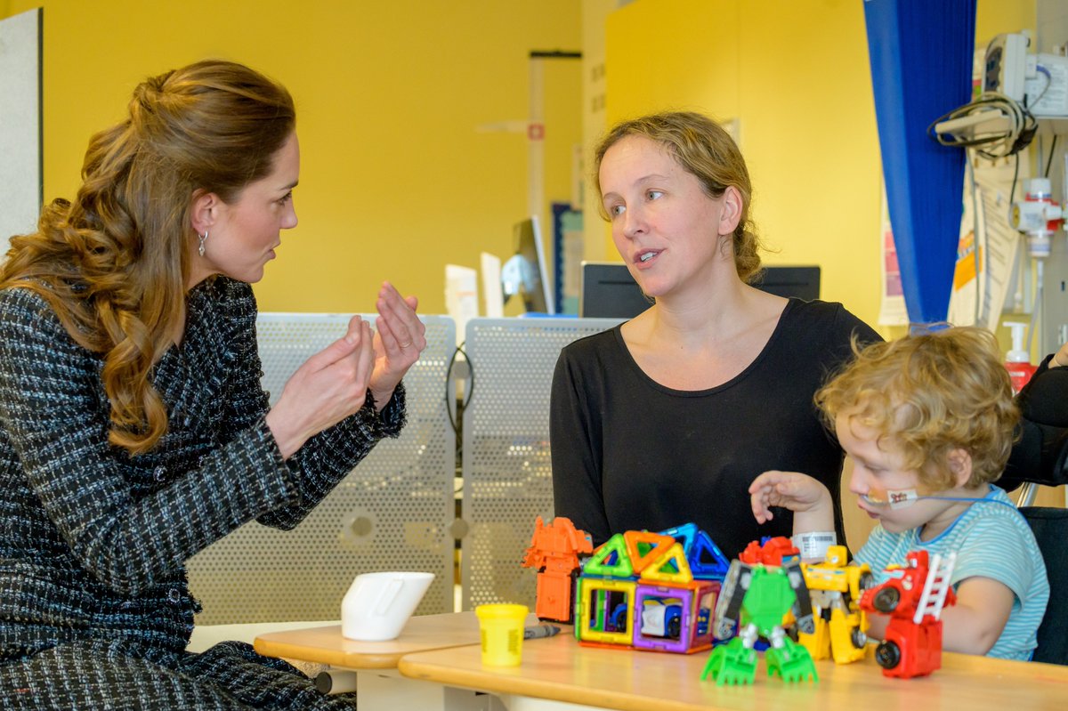HRH The Duchess of Cambridge with an Evelina London patient and his mum in Beach ward.