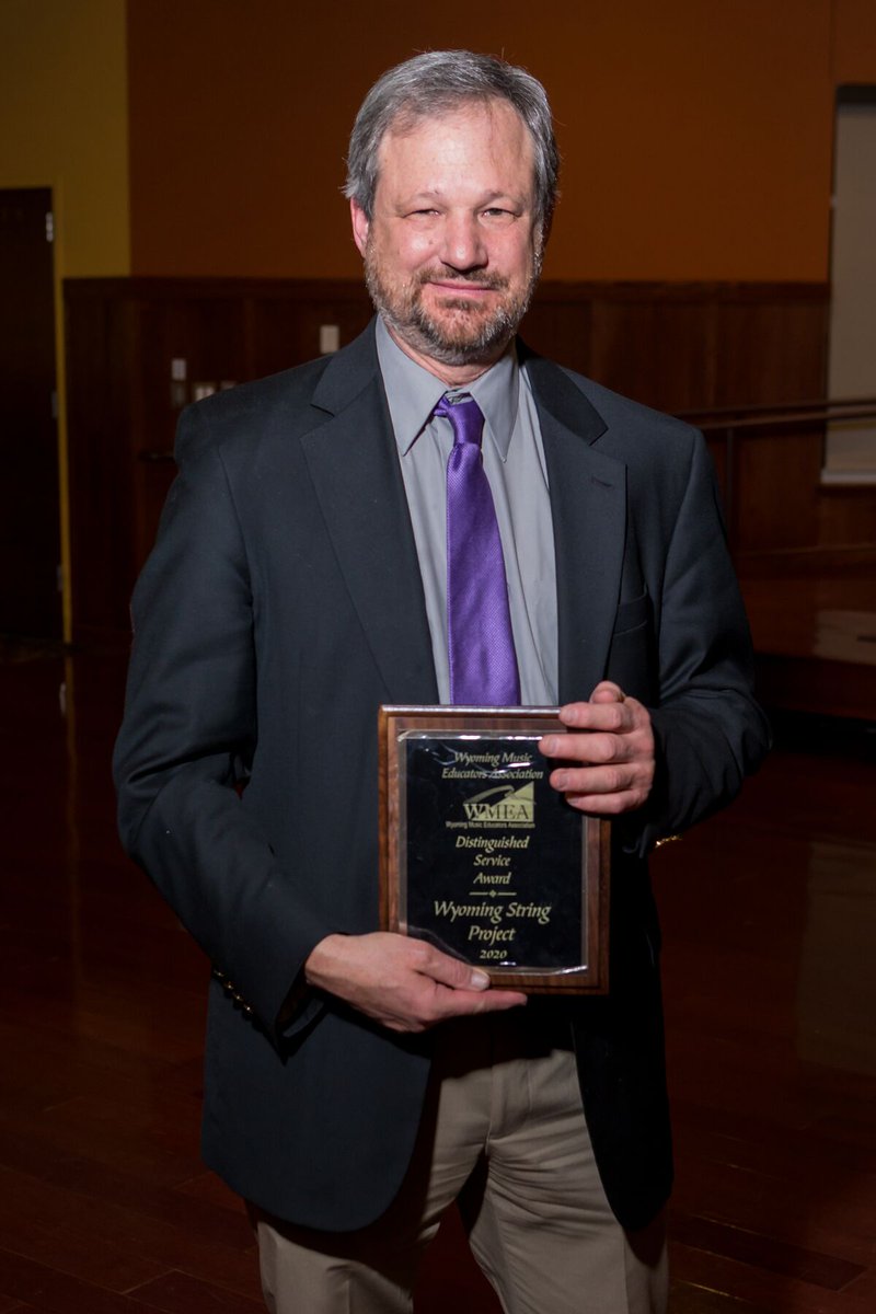 UWArtsSciences's tweet photo. .@UWYOMusic’s James Przygocki was given the 2020 Distinguished Service Award by the Wyoming Music Educators Association last week at the organization’s annual banquet in Gillette.

https://t.co/rgLsPdUONk

#PrepareForCompleteLiving #TheWorldNeedsMoreCowboys #UWyo https://t.co/mlqL7Rlb3s