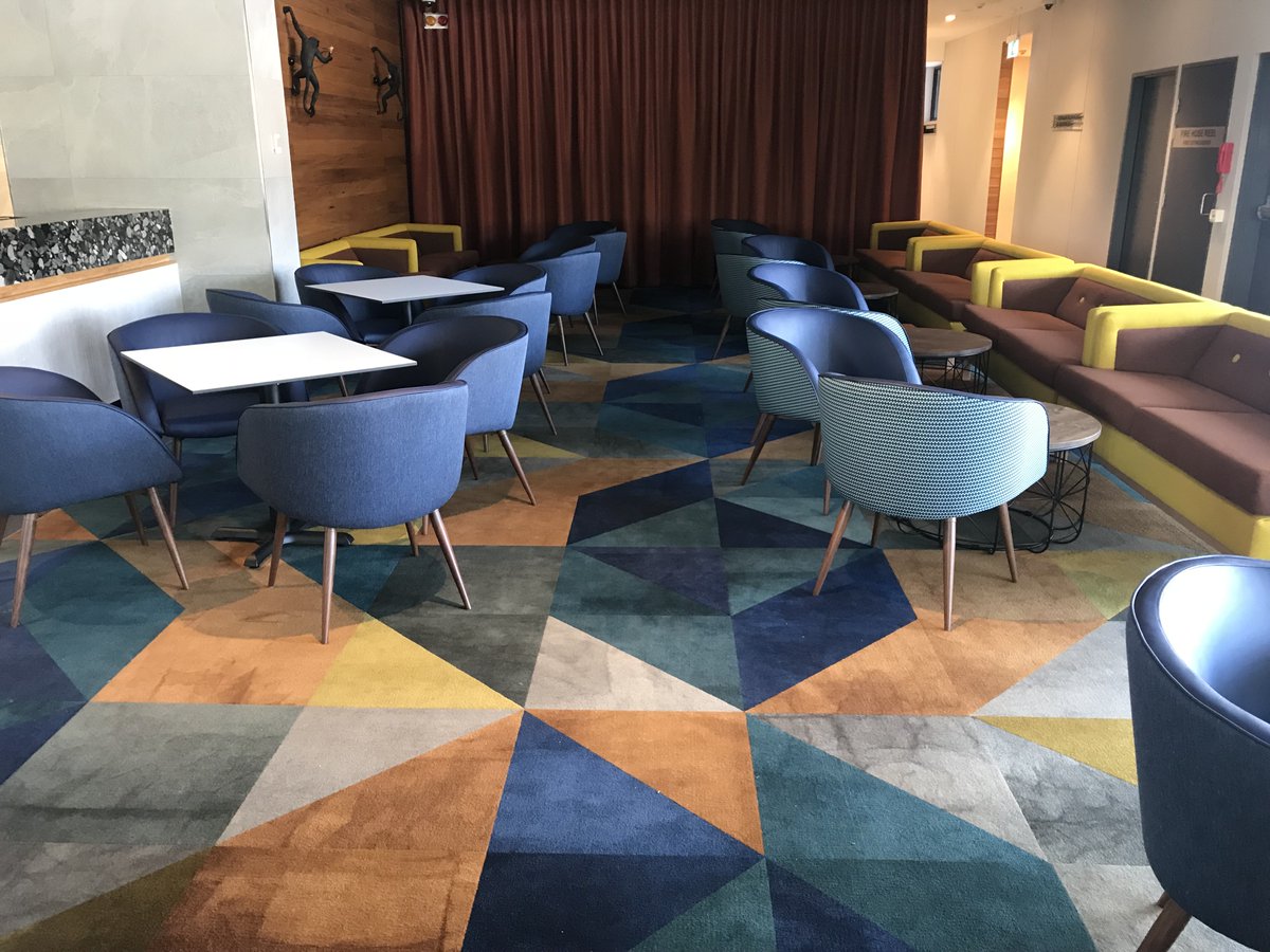 Hand cut carpet tiles are a real treat when designed thoughtfully. Here's one of the clubs we installed last year #designer #paynterdixon #ejearchitect #flooring #carpet