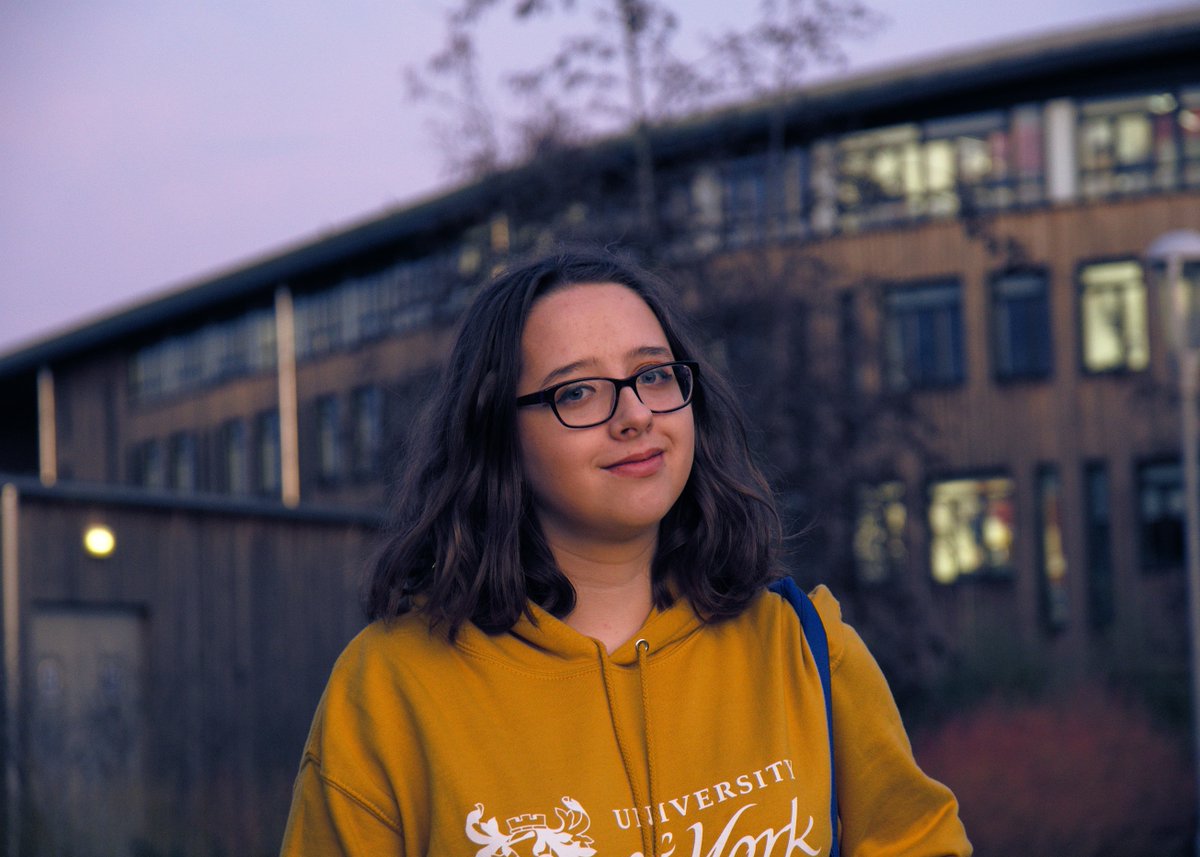 Rach in a yellow York hoodie