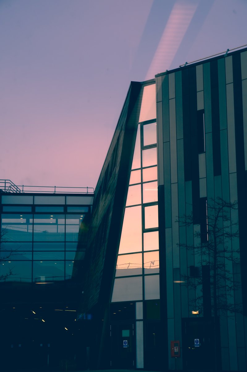 Law and Management building, reflecting the sky in its large windows
