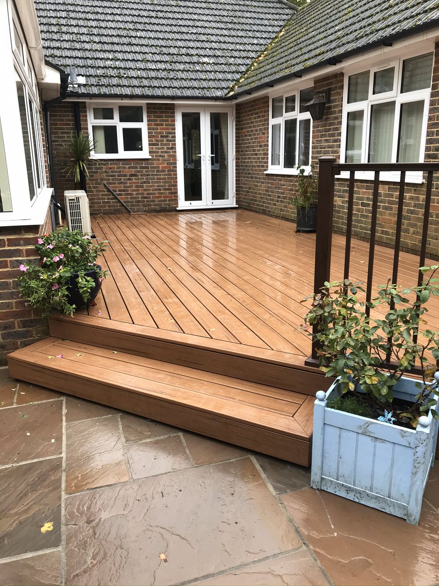 BuckinghamsLand's tweet image. From an old tired decking to a bright spacious area ready for entertaining. Completed in @trexcompany tiki torch composite decking with a bronze hand rail. #hardlandscaping #hardlandscapingspecialists #composite #decking #gardendesign