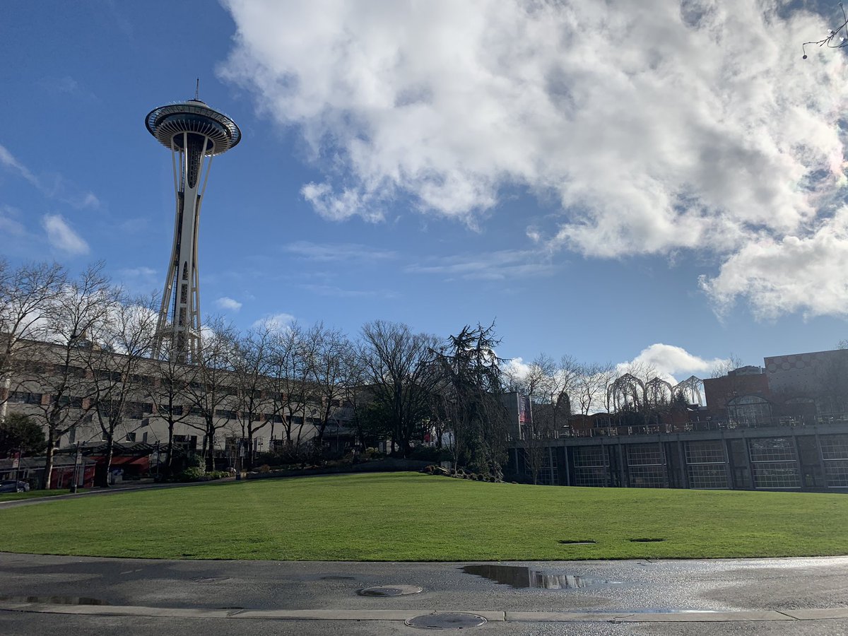 Space Needle over the Fisher Pavilion and lawn at Seattle Center