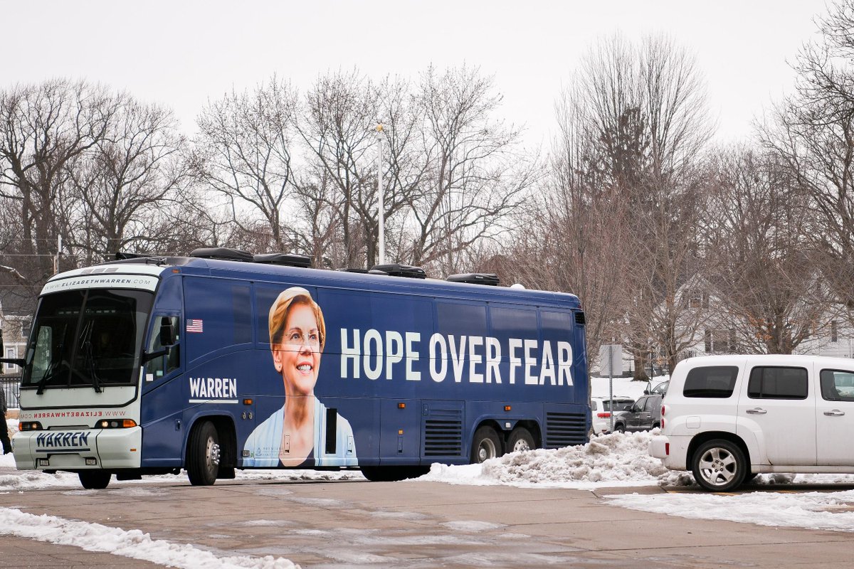 Elizabeth's campaign bus with a photo of her on the side and the words, "HOPE OVER FEAR."