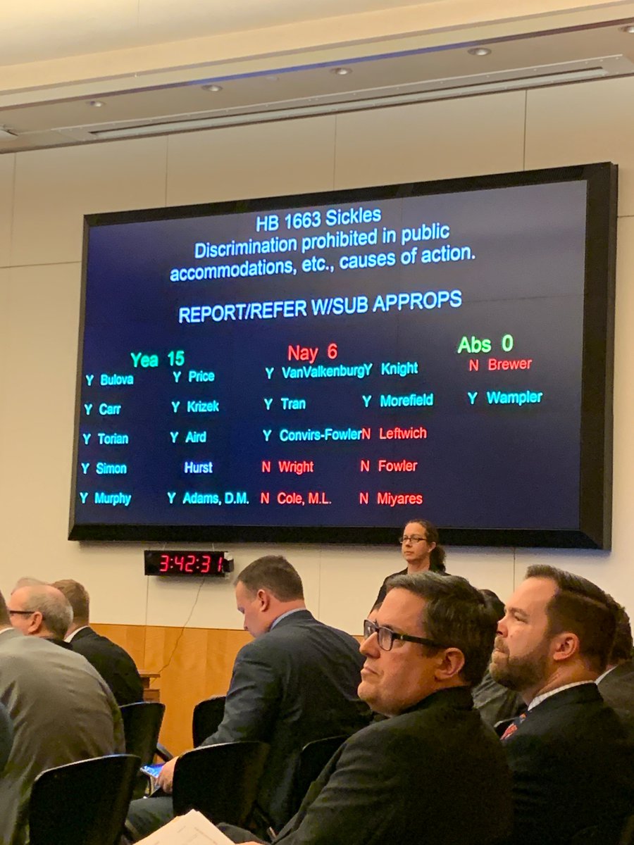 Computer screen showing the passage of the bill through committee