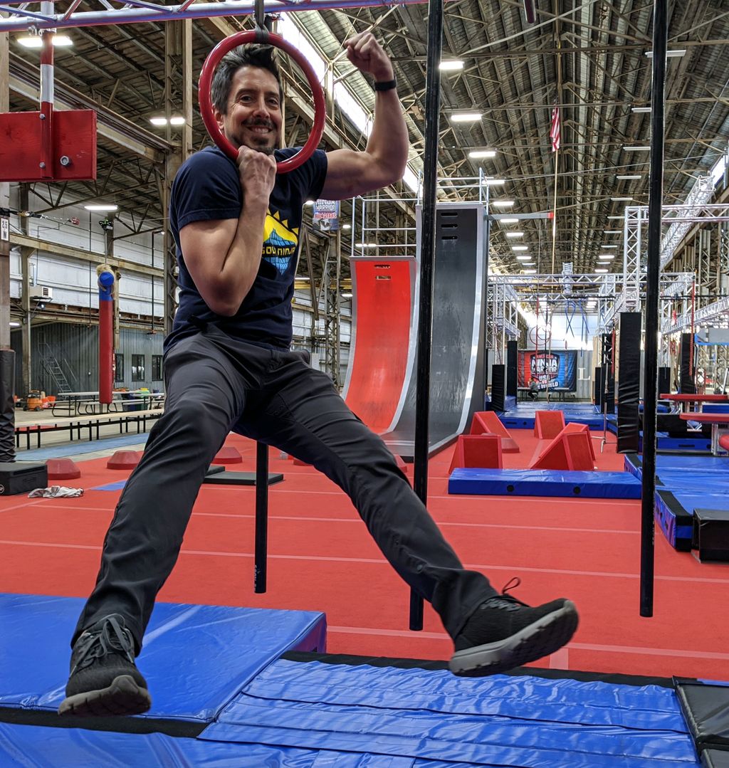 SolarNinjaTroy doing a one arm lock off on a ring