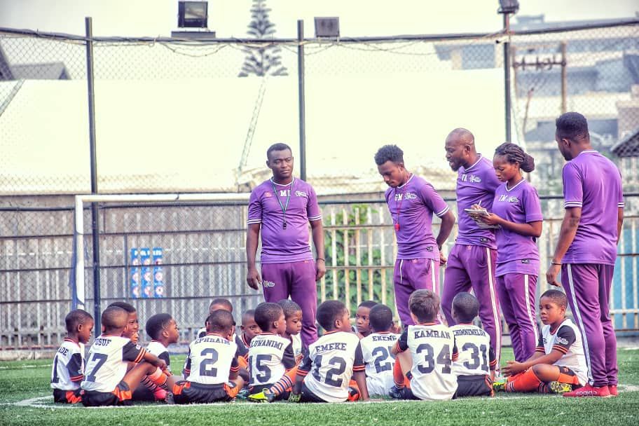 City Sports School kids pep talk after a training session