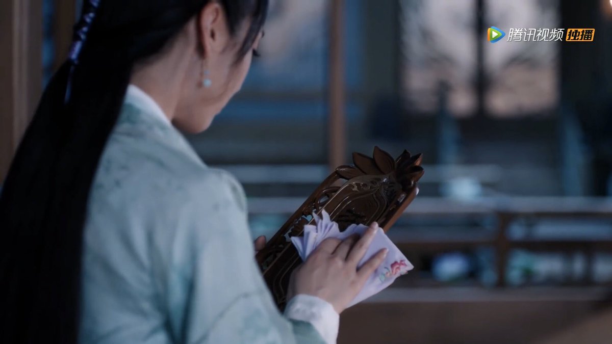 this is their family’s 祠堂 (ancestral temple). closely tied to confucian culture of 孝 (filial piety), they are very important for chinese families. chinese traditionally honor lineages here. yanli is polishing a 牌位 (ancestral tablet) in honor of her parents.