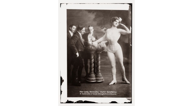 Fascination undoubtedly becomes fetishization when it comes to strongwoman Katie SandwinaConstantly gushed over as surprisingly feminine, "perfect proportions magnified," also a vessel for hopes of suffragists who imagined a "world of Sandwinas" who outmatched their husbands/8