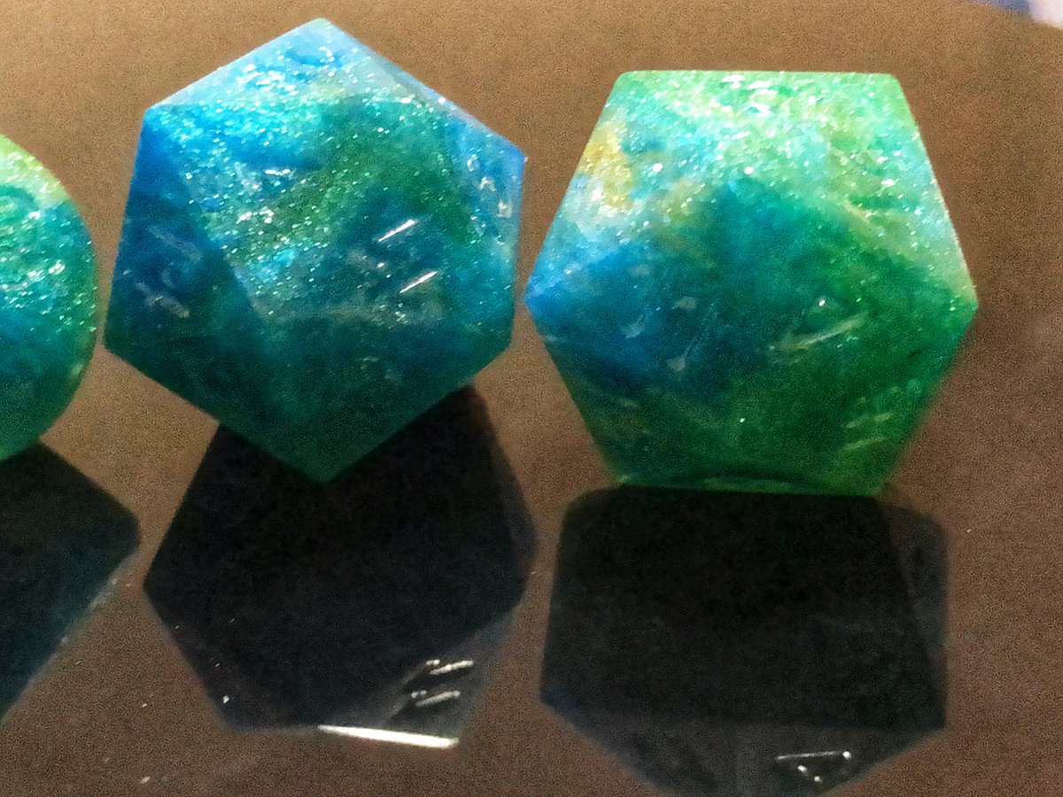 AlkeshOne's tweet photo. When someone asks you to make them a set of peacock dice, only the finest blues, greens, and golds will do. WIP, unsanded, unpolished, and uninked.
#resindice #handmadedice #resin #dice #dicegoblin #dnd #dnddiceset #dnddice #diceset #polyhedradice #resinart #dicemaking https://t.co/VbVDSo98gH