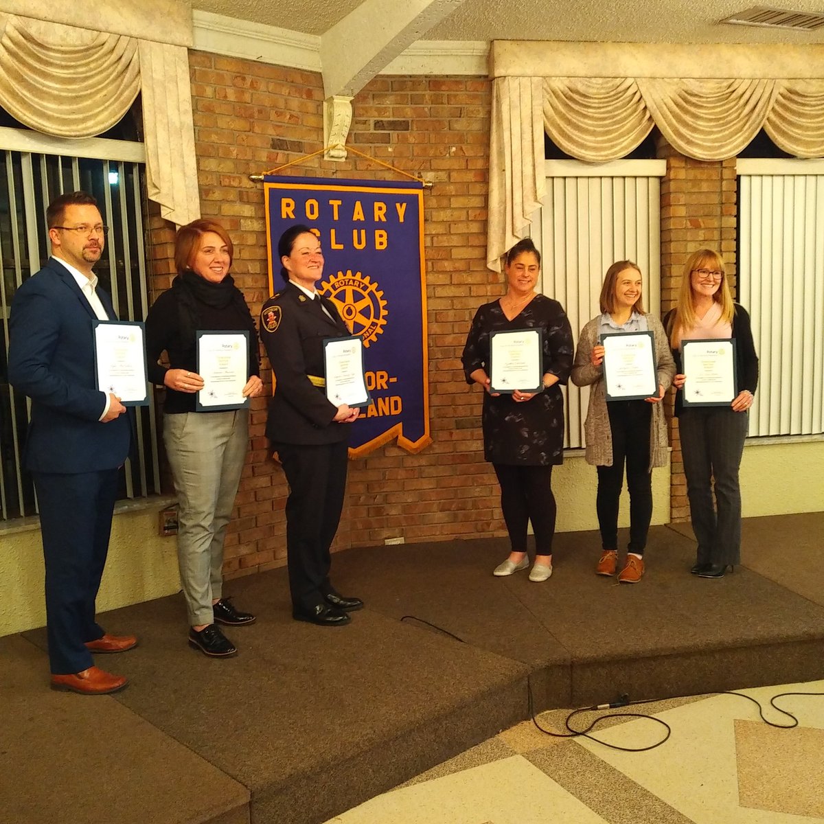 GordonOrr66's tweet photo. Celebrating Vocational Service Award winners at the @RoselandRotary Club: Ryan MacEachren - Advanced Rehabilitation Centre; Toni Maceroni @CottaCatering ; @TfryerTammy @WindsorPolice ; Cynthia Cakebread @EssexON ; Jordynne Ropat @plantjoyyqg ; @LisaPorter2 @UWindsor #Bravo #YQG https://t.co/0s59HJyaqB
