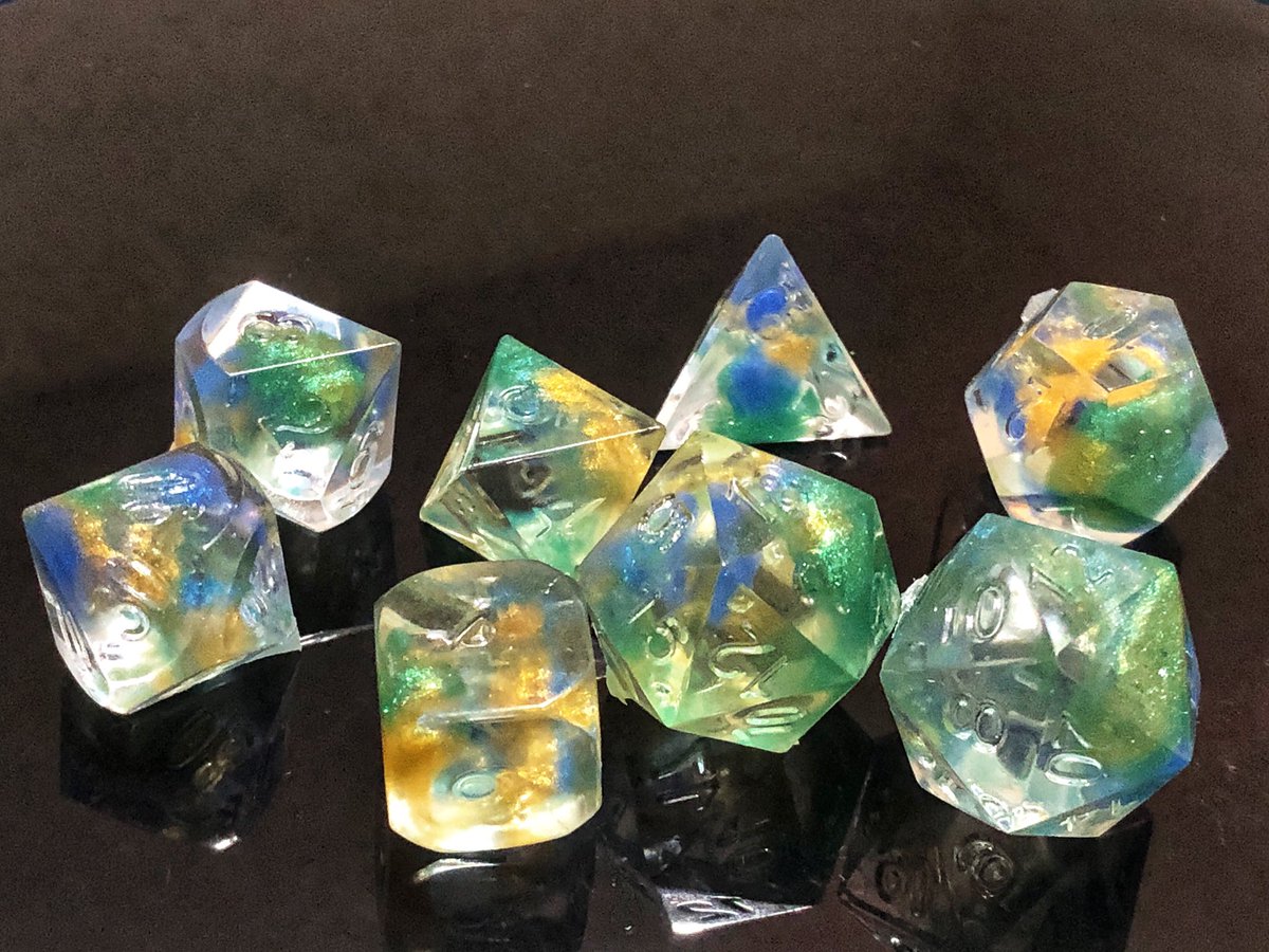AlkeshOne's tweet photo. I’ve been told that sea glass is a thing, so I had someone steal these from a royal chamber. WIP, U.N. sanded, unpolished, and uninked.
#resindice #handmadedice #resin #dice #dicegoblin #dnd #dnddiceset #dnddice #diceset #polyhedradice #resinart #dicemaking #tabletopdice https://t.co/iGmCppGSy7