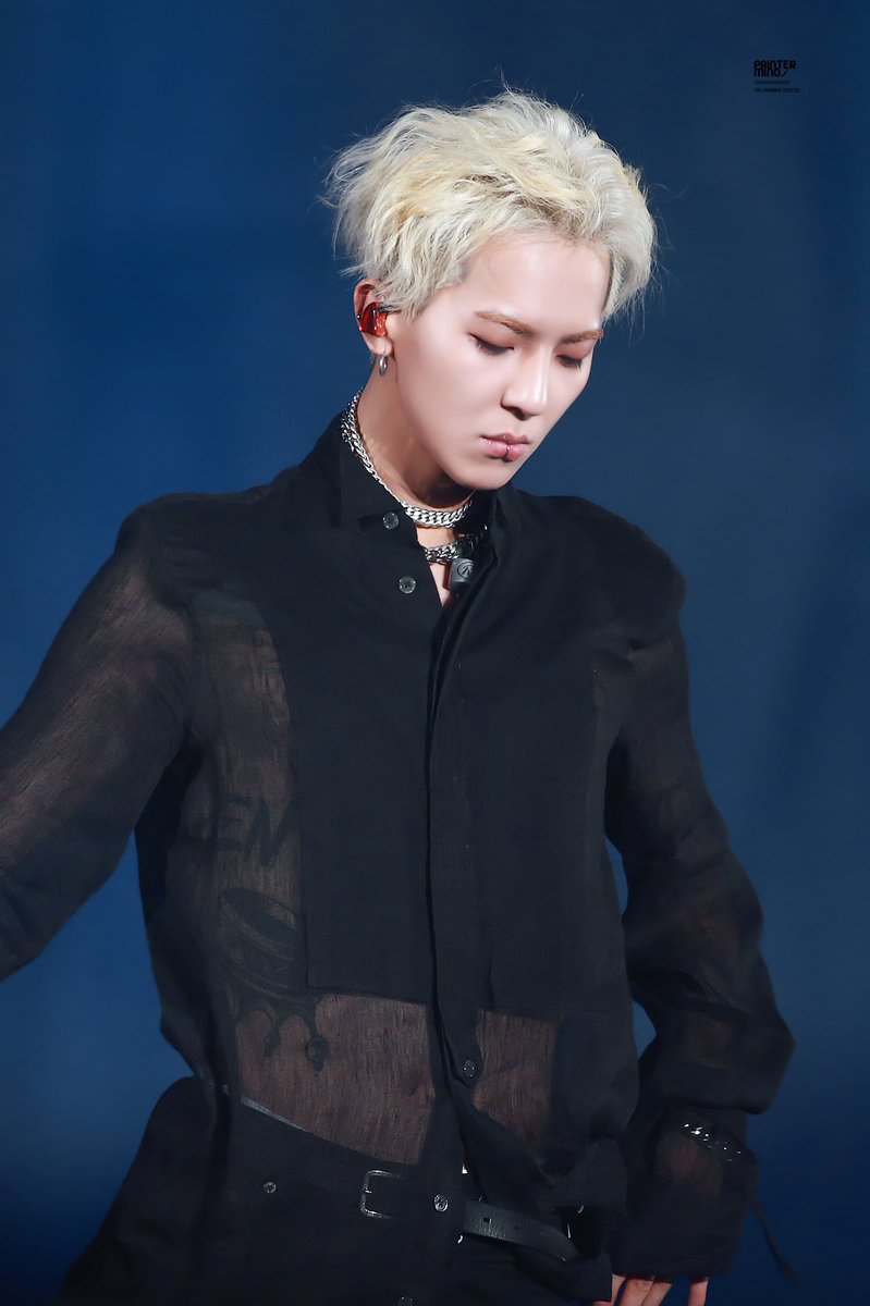 blonde and browless mino in his see-through shirt