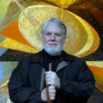 Space art pioneer Lowry Burgess with halo-like painting and holding an umbrella stick.