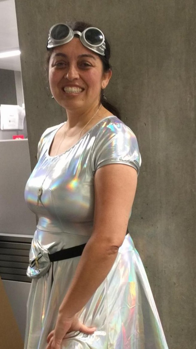 Me in a shiny metallic dress and wearing steam punk goggles.