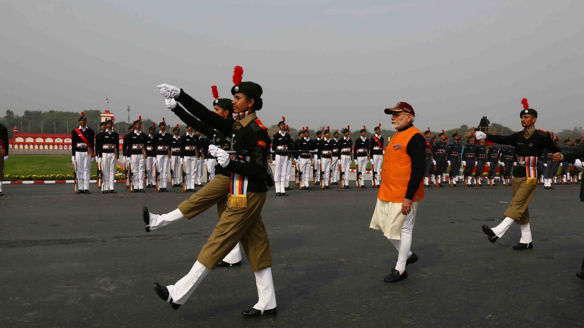 HQ_DG_NCC's tweet photo. PM Narendra Modi attends the PM Rally at Carriappa Parade Ground ,recieved by #DGNCC , is given the Guard of Honour by NCC Cadets of all Three Wings . @SpokespersonMoD @PMOIndia @drajaykumar_ias https://t.co/ZGts2WqtUn