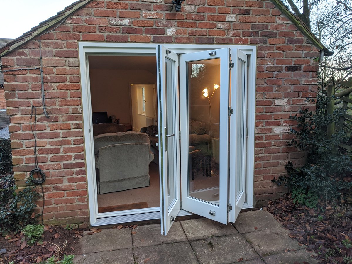 TimberWindowUK's tweet photo. Finishing phase 2 of this project in #Stapleford #Nottingham timber flush casement windows, French doors and this stunning bi-fold doorset https://t.co/78HnCokKtd
