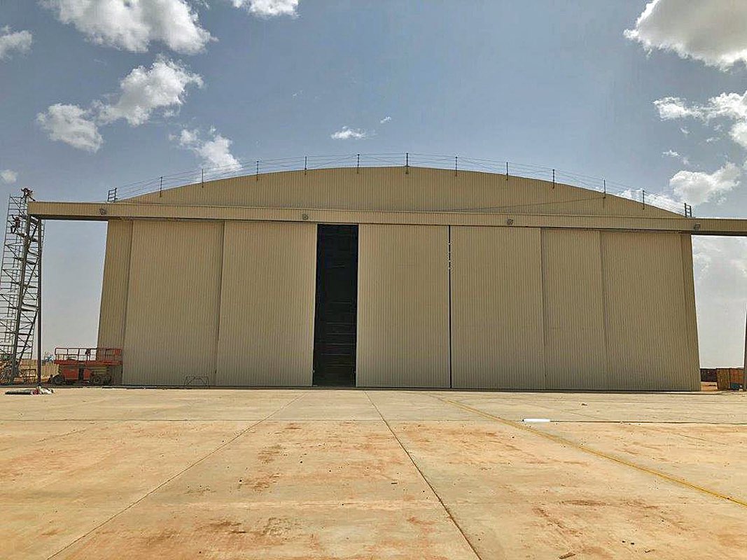 An aircraft hangar created in Christchurch, Dorset, has been built 5,600 miles away in one of the remotest parts of Africa.
John Reid &amp; Son (REIDsteel) Ltd designed, made and supplied the 140-tonne structure for a C130 Hercules aeroplane in Niger.