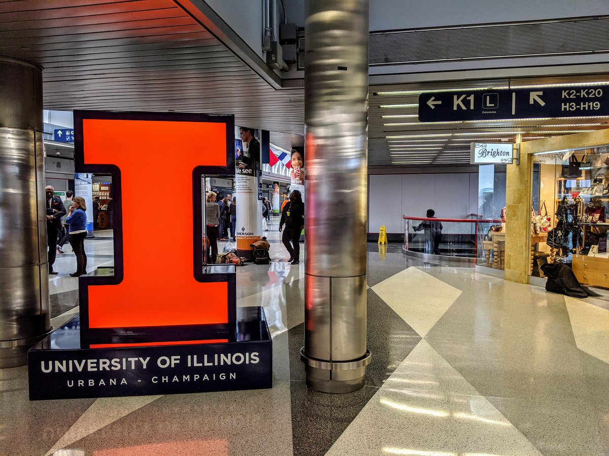 UofIllinois's tweet photo. O'Hare looks good in orange &amp; blue 🔶🔷

This LED-illuminated 7 feet by 6 feet Block I statue is stationed in Terminal 3 in O'Hare International Airport.

If you see it, share it! #PowerOfI https://t.co/Ixap8QKW11