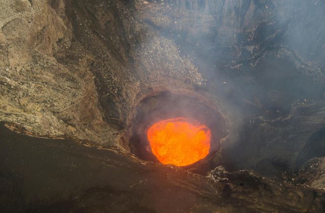 One of five lava lakes that used to roil in the caldera of Ambrym volcano in Vanuatu. In the winter of 2018, the volcano erupted, causing all of these lakes to disappear. (Photo: Robert Harding/Alamy Stock Photo)