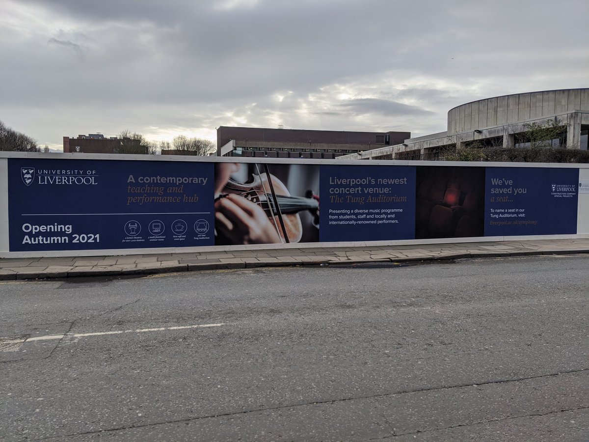CTackley's tweet image. Lots of action behind the smart new hoarding at the site of our new auditorium.
