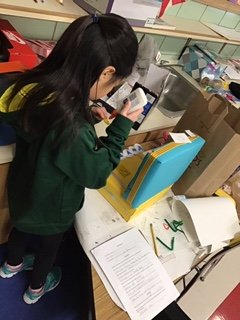 Students are creating Great Lakes State floats based on their research.