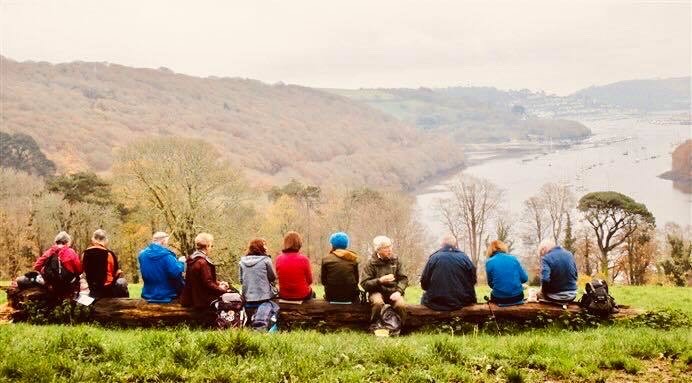 Ramblers eating lunch with a view. 