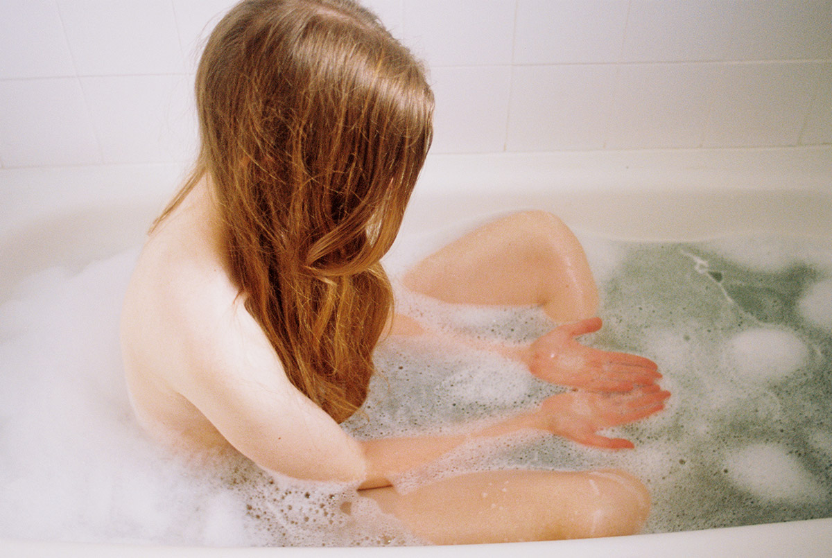 Works by Spanish photographer Alba Yruela, 2010s, who documents small, intimate moments in her daily life