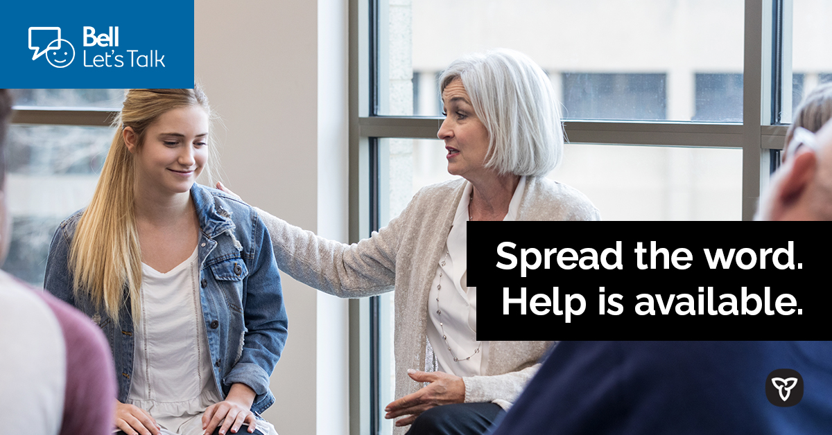 One person consoling another with the text, Spread the word. Help is available.