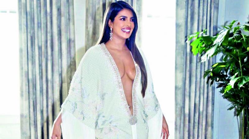 DPN__India's tweet photo. Wendell Rodricks, Suchitra Krishnamoorthi argue over Priyanka Chopra’s look - Jumping to Priyanka’s rescue was actress Suchitra Krishnamoorthi, who wrote a long post defending the actress’ right to wear what she likes.  #Bollywood #Entertainment #GrammyAw https://t.co/PdZxZPyUYd https://t.co/XV3ChVQn4H